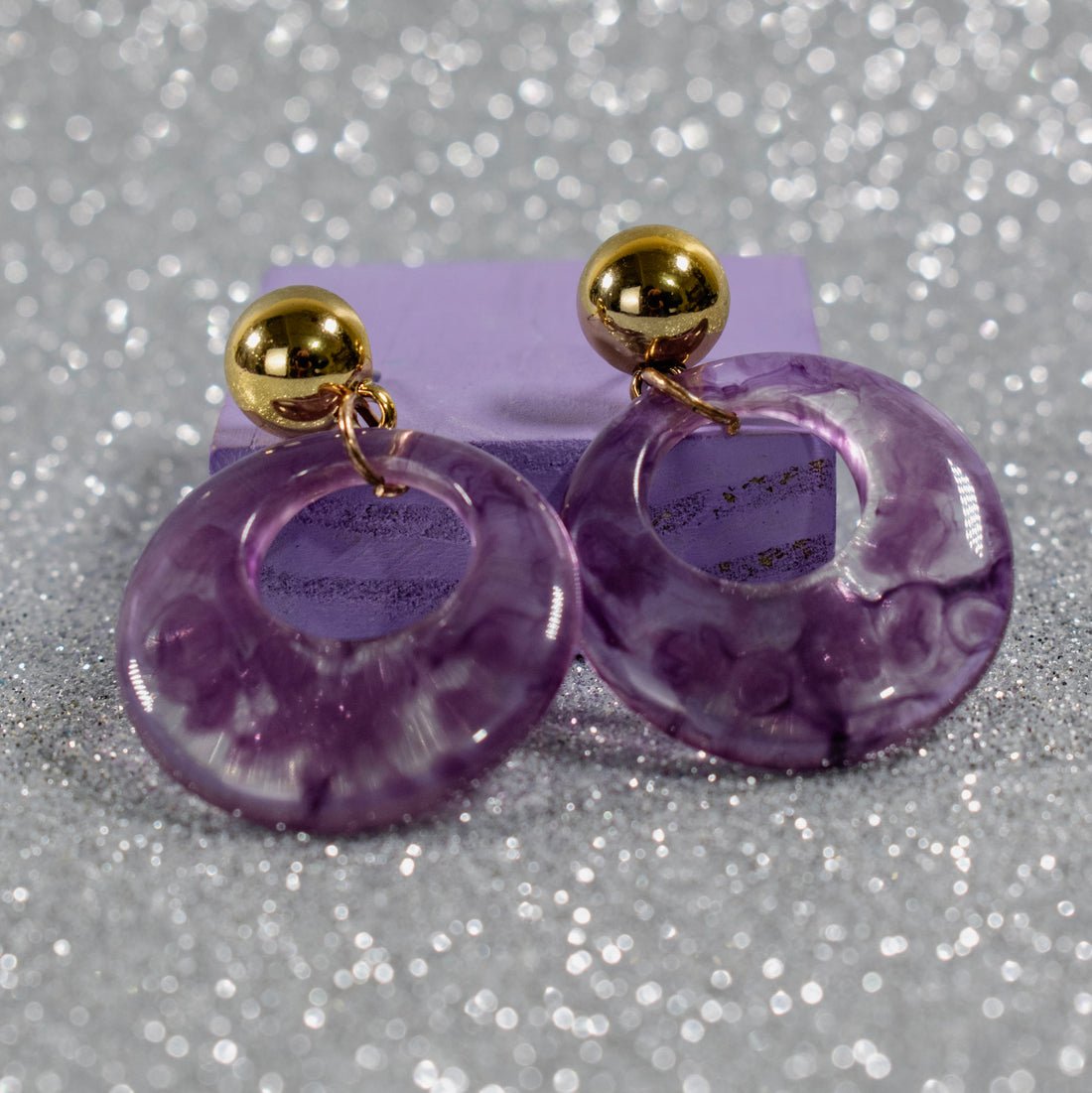 ¡NEW! Aretes Aura Violeta